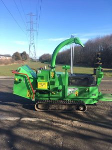 An image of a wood chipping machine